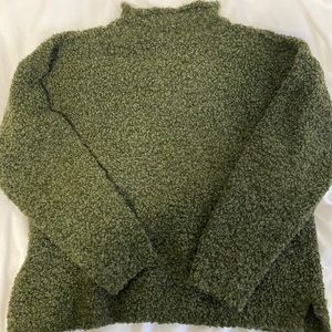 Hand knitted wool turtleneck from a boutique.
